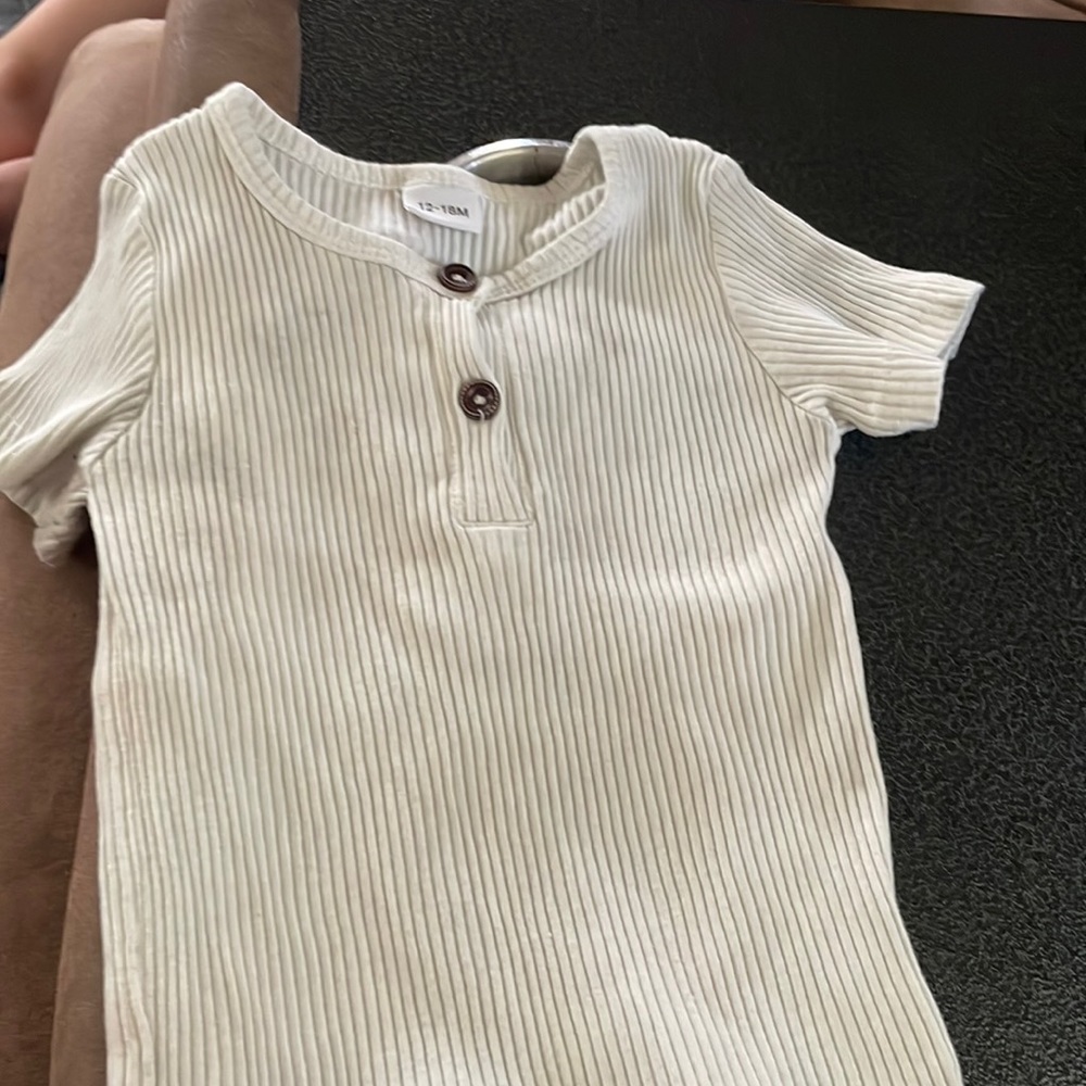 White shirt , matches with white shorts